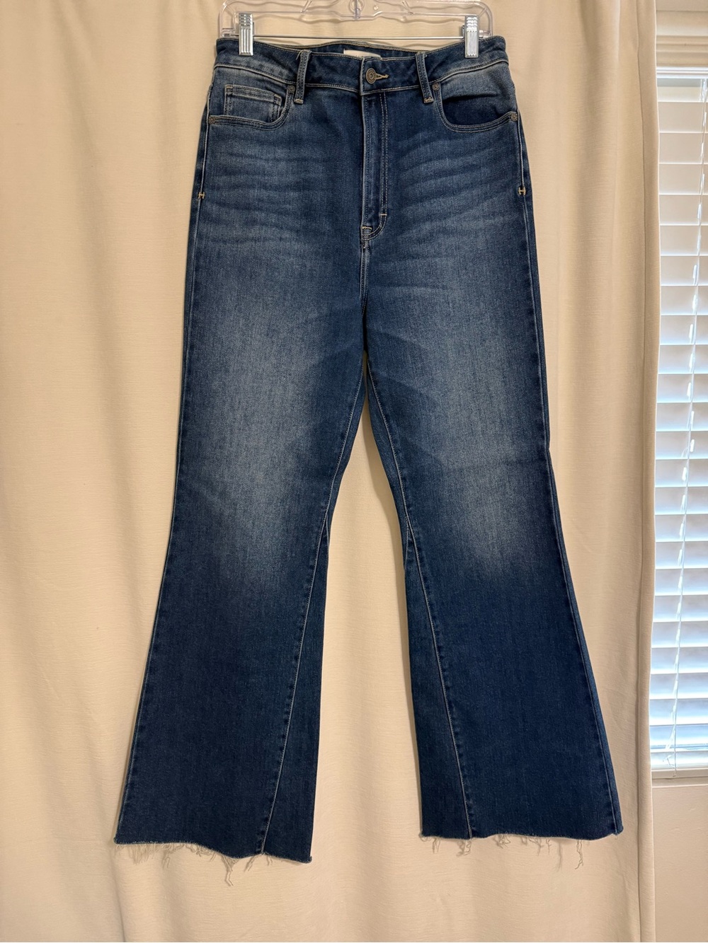 High-Rise Dark Blue Flare Jeans with Raw Hem